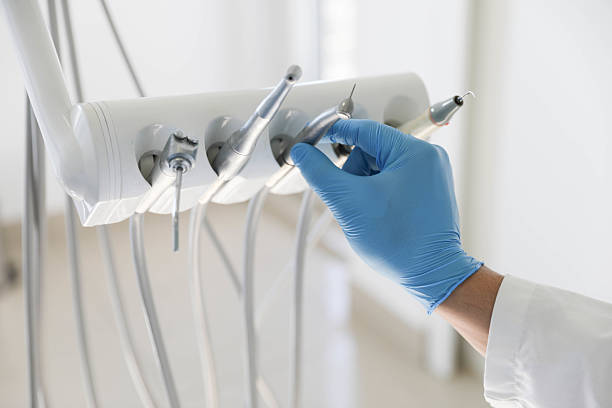 Professional Root Canal Treatment technician working in Lake St. Louis, MO